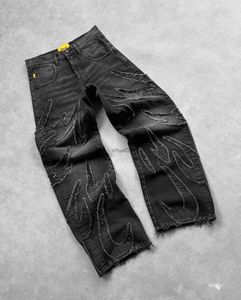 Jeans masculin y2k rétro noir de poche noir mens hip hop punk bord original jean brodé jeans rétro motif épissé jeansl2403