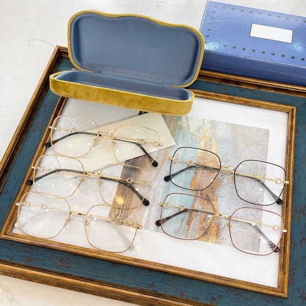 Designer de luxo masculino óculos de sol femininos família cavalo fivela caixa lente plana ni deusa mesmo 0883 óculos lisos de metal podem ser combinados com graus
