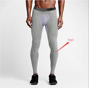 Pantalones de baloncesto deportes al aire libre de los hombres Fitness de baloncesto Rápidamente Pantalones de secado Correr Compresión Gimnasio Joggers Pantalones cortos flacos Leggings para hombre pantalones