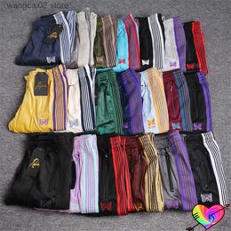 Pantalones de hombre 2022 Agujas multicolores Pantalones deportivos Hombres Mujeres 1 1 Alta calidad Multi bordado Mariposa Raya Agujas Pantalones AWGE Pantalones T230602