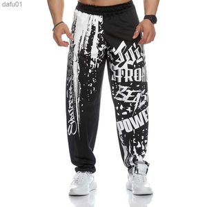 Pantalons pour hommes 2022 Muscle Men Sports Mesh Pants Male Thin Casual Running Training Loose Oversized Pantalons Hip-Hop Imprimé Sportpants L230520