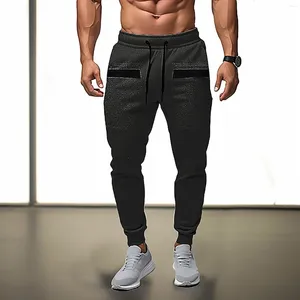 Pantalones para hombres 2023 Otoño Color sólido Gran bolsillo Diseño de cremallera Cordón Moda Casual Deportes Entrenamiento Corbata