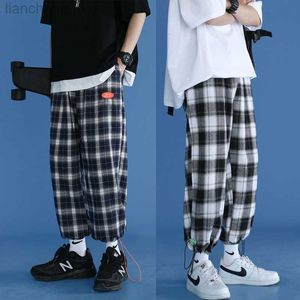 Pantalons pour hommes 2023 nouvelle mode coréenne unisexe tout-match à la mode flanelle pantalon large lâche Streetwear Joggers Harajuku pantalon à carreaux huit Pantt W0411