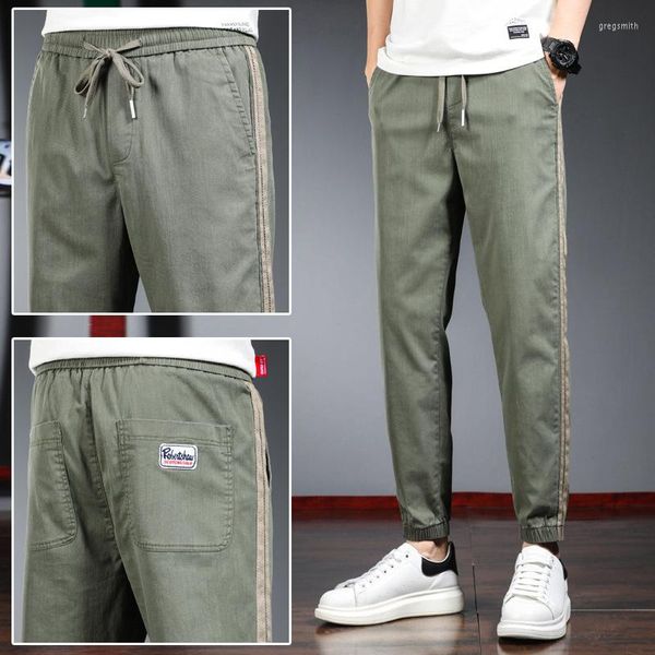 Pantalones para hombres 2023 pantalones deportivos de primavera y rayas de verano tendencia a la tendencia de todo el paquete de cuerda de los pies de la cuerda harlem hombres casuales