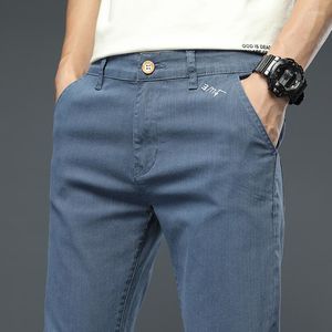 Pantalones de hombre 2023 estilo clásico de primavera para hombre pantalones de moda ajustados informales con bordado de letras para hombre negro lago azul gris claro