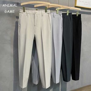 Pantalones para hombres 2023 primavera verano pantalones casuales pantalones pantalón de ajuste delgado trabajo de la cintura elástica pantalones machos gris negro talla grande 40 42 y240513