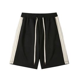 Herenbroek 2023 Zomer heren shorts losse ontspannen veelzijdige capris strandbroek mode lint casual midden