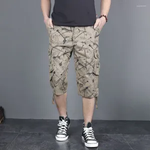 Pantalon masculin 2024 Vêtements Summer Poucles imprimées bouton de mode épissé de mode lâche résistant camouflage de coton pur capri