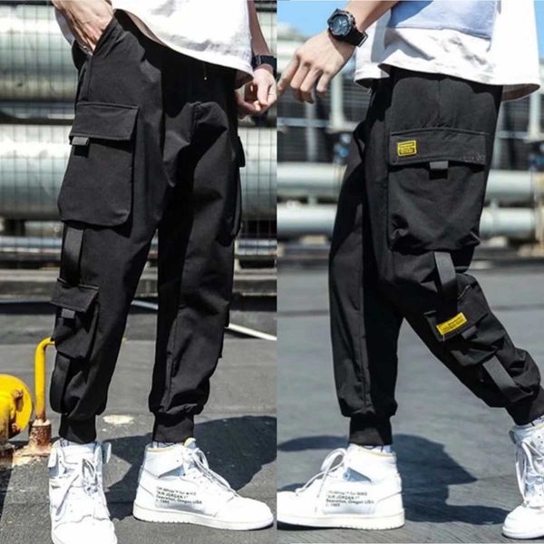 Pantalones para hombres 2024 nuevos pantalones de carga para hombres golpes de hip hop casuales de coloridos pantalones de bolsillo múltiples ropa de la calle camisas deportivas pantalones de deportesl2405