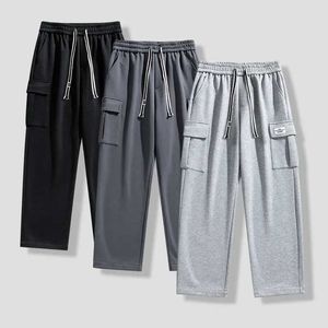 Pantalon masculin 2024 Nouveau pantalon décontracté pour hommes automne / hiver street lâche Hip Hop Mens Bag jogging multi-poche pantalon de sport