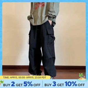 Herenbroek 2024 Nieuwe Mens overalls Multi Pocket American Hip Hop Pants Mens Ins Street Spring en Autumn Jumping Attack PantsL2404