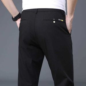 Pantalon masculin 2024 Pantalon décontracté printemps / été, hommes, hommes portez des pantalons de soie de glace pour hommes