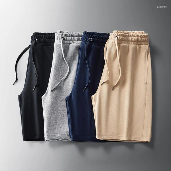 Pantalones para hombres 2024 Pantalones cortos casuales de verano de alta calidad de color sólido de playa con capucha de lana de algodón de cinco puntos