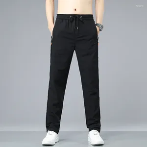 Pantalones para hombres 2024 verano suelto delgado y delgado casual coreano coreano seda seda de seda transpirable pantalones de bolsillo macho