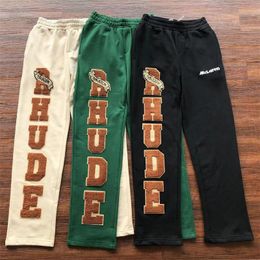 Pantalons pour hommes 23SS de haute qualité 1 Rhude coupe ample serviette brodée grand pantalon de survêtement cordon multi-poches décontracté 231117