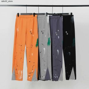 Herenbroek 24FW hoogwaardige nieuwe mode lente/zomer spray Shining Sports Pants Mens Street Sports Pants Q240417