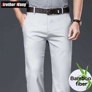 Pantalones para hombres de 4 colores fibra de bambú pantalones casuales delgados primavera y verano nuevos negocios estiramiento color sólido pantalones de color caqui marca Y240514