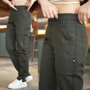 Pantalons pour hommes Arrivoirs Men de façon décontractée Solide classique mince étendue droite longue Black Grey Elastic Raise Design masculin pantalon