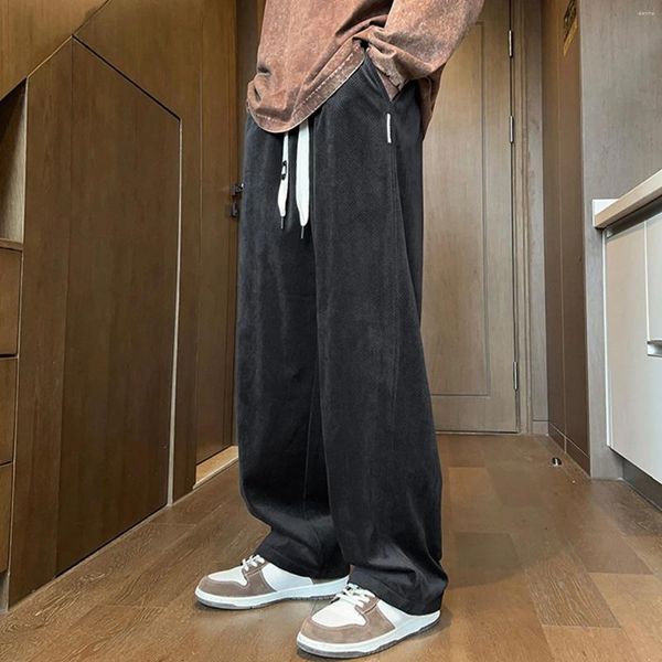 Pantalon pour hommes automne décontracté avec drapé en velours côtelé et tube droit coupe ample jeunesse couleur unie à lacets sport