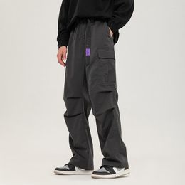 Pantalon masculin cargaison de taille élastique ceinturée pour hommes poches patchworks extérieur pantalons de survêtement sportifs larges