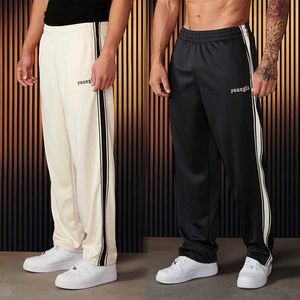 Herenbroek Zwart -wit splitsen Casual broek Mens gestreepte embryo Fitness Training Sweatanten rechte been sweatanten J240429