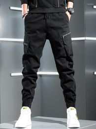 Pantaloni da uomo neri autunno cargo uomo streetwear hip hop pantaloni da jogging elasticizzati con coulisse pantaloni uomo cotone grandi tasche casual