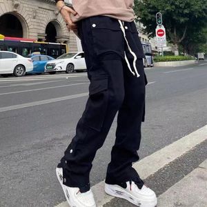 Pantalons pour hommes Black Cargo Vêtements pour hommes Pantalons évasés Europe et Amérique Poche High Street Harajuku Bell-Bottom Mâle Sweatpan221q