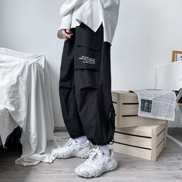 Herenbroek zwarte vrachtheren hiphop streetwear mode jogger harem broek man casual hevel mannelijke grote grootte 5xl 230414