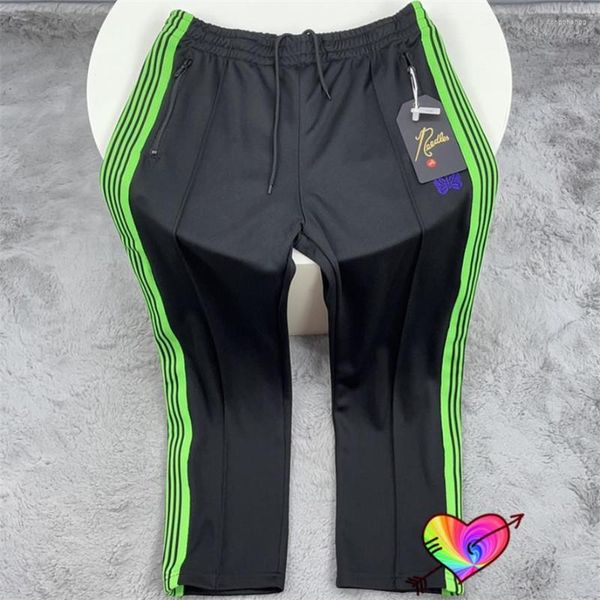 Pantalones de hombre Agujas negras Pista 2022 Hombres Mujeres Raya verde Púrpura Mariposa bordada High Street AWGE Pantalones