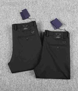 Pantalons pour hommes Business gentleman luxe pantalons pour hommes simple conception de couleur unie soie lisse matériau élastique top designer de marque RM0C