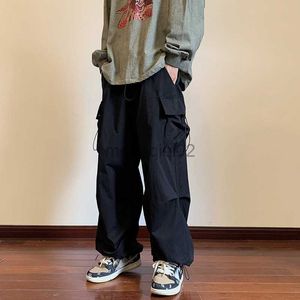 Pantalon Cargo pour hommes, Streetwear Hip Hop, taille élastique, longueur cheville, noir, Harajuku, poche décontractée, pour femmes, Y23