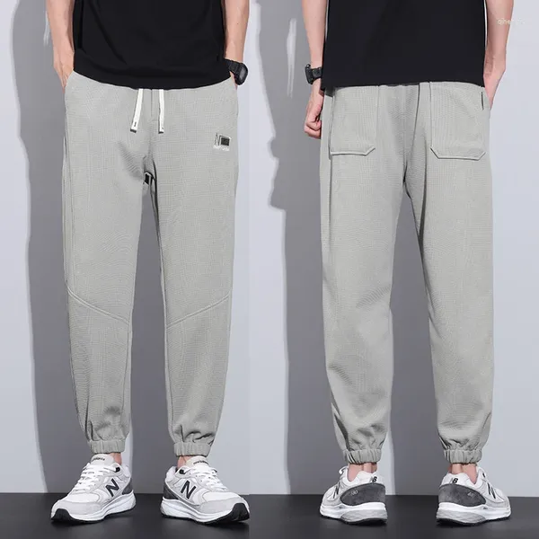 Pantalones de hombre Casual Cargo holgados pies agrupados cintura elástica cordón pantalones moda masculina gris jogging streetwear pantalones de chándal