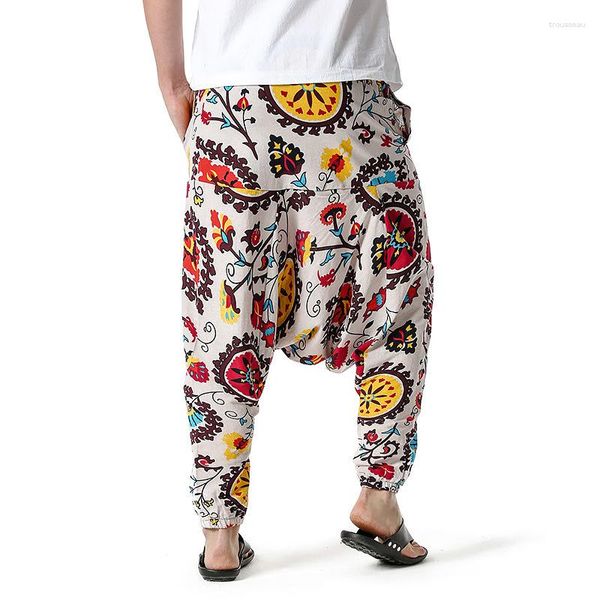 Los pantalones de los hombres casuales son versátiles en tamaños grandes personalizados Harun Yoga ajuste holgado de moda y simple entrepierna colgante