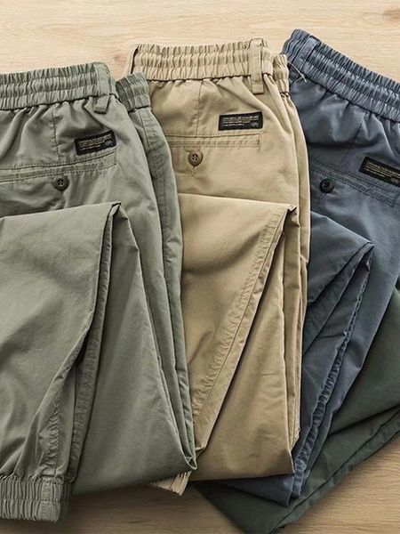 Pantalones para hombres hombre casual de moda suelta cintura elástica pantalones de carga sólidos hombres 2024 primavera verano apriete pies hacia arriba pantalones de chándal