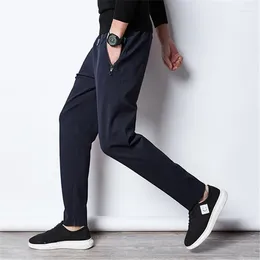 Pantalones para hombres Casual Hombres Ropa con sobrepeso Negro Moda Streetwear Pantalones de chándal Tallas grandes Pantalones deportivos Ropa masculina