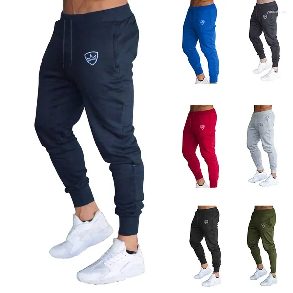 Pantalon pour hommes à crampons de couleur masculine conception de poche slim fit du logo de la couronne