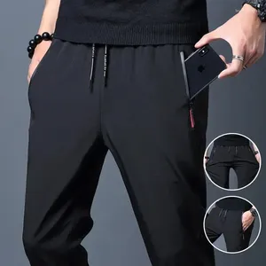 Pantalon masculin Stretch Slim Fit Elastic Jogger coréen Classian Classic Blue Black Grey Gris Male Brand Male plus taille 4xl 5xl