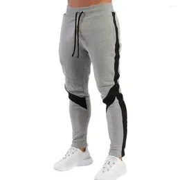 Pantalon masculin pantalon décontracté sports de taille élastique élastique avec poches pantalon à sec toute la longueur pour la mode au printemps