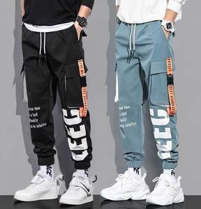 Herenbroeken klassieke streetwear casual heren linten harem joggen mannelijke slanke fit veer vracht multipocket broek J7 230317