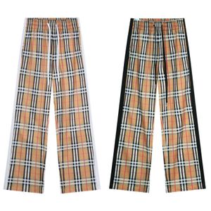 Herenbroek ontwerper Klassieke geruite zwart-wit gestreepte broek met contrasterende kleuren aan beide zijden 0CLT