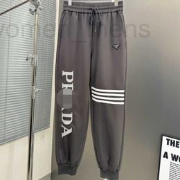 Diseñador de pantalones para hombres para hombres, primavera y otoño, versión coreana de gran tamaño, suelta, versátil y moderna pantalones de ocio deportivos, pantalones sanitarios WEF1