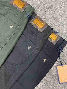 Pantalones para hombres Diseñador LLL pantalones de vestir de lujo Negocios Pierna recta Casual Marca de moda Leggings de color sólido Negro verde al por mayor CWGQ