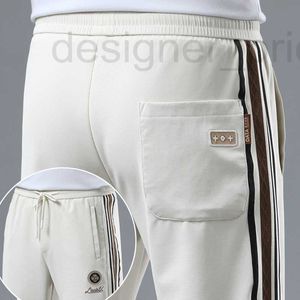 Herenbroeken ontwerper luxe heren casual broek modieus borduurwerk slank fit trendy merk high-end kleine been broek sportbroeken lente en zomer nieuwe stijlen getc