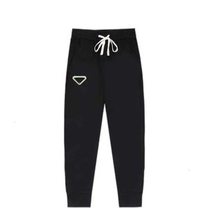 Diseñador de pantalones para hombres puujia correcta versión alta de primavera verano nuevo metal sello casual estilo clásico nunca cansado de ver la misma C