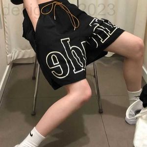 Pantalones para hombres Diseñador Rhude Shorts Diseñadores Mens Baloncesto Camisa corta Luxurys Summer Beach Letter Mesh Street Fashion Popular Sweetpants Designer 9A8W