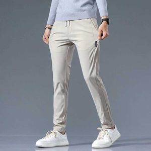 Pantalons pour hommes Pantalons décontractés élastiques pour hommes classique léger coupe ajustée pantalons serrés pour hommes été pull droit survêtement pantalon kaki solide pour hommes J240328