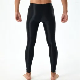Pantalon pour hommes leggings élastiques silky lisses slim avec une élasticité à renflement en U convexe