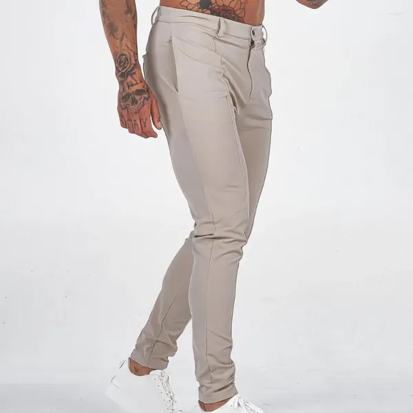 Pantalon pour hommes taille élastique respirant pantalon mi-affaires coupe ajustée couleur unie longueur cheville avec poches inclinées bouton