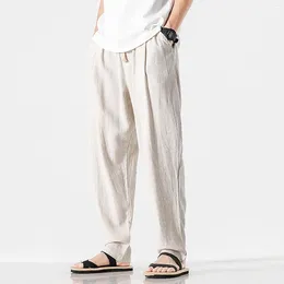 Pantalones para hombres Pantalones de chinete de cintura elástica Los bolsillos laterales se elevan largas holguras de los streetwear casuales para hombres pantalones delgados de verano