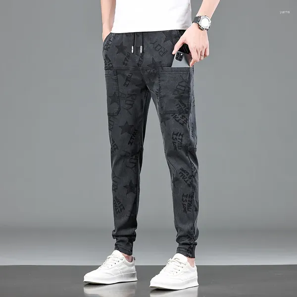 Pantalones de hombre cintura elástica Casual diseño estampado multibolsillos moda cómodos pantalones deportivos sueltos elásticos para hombres